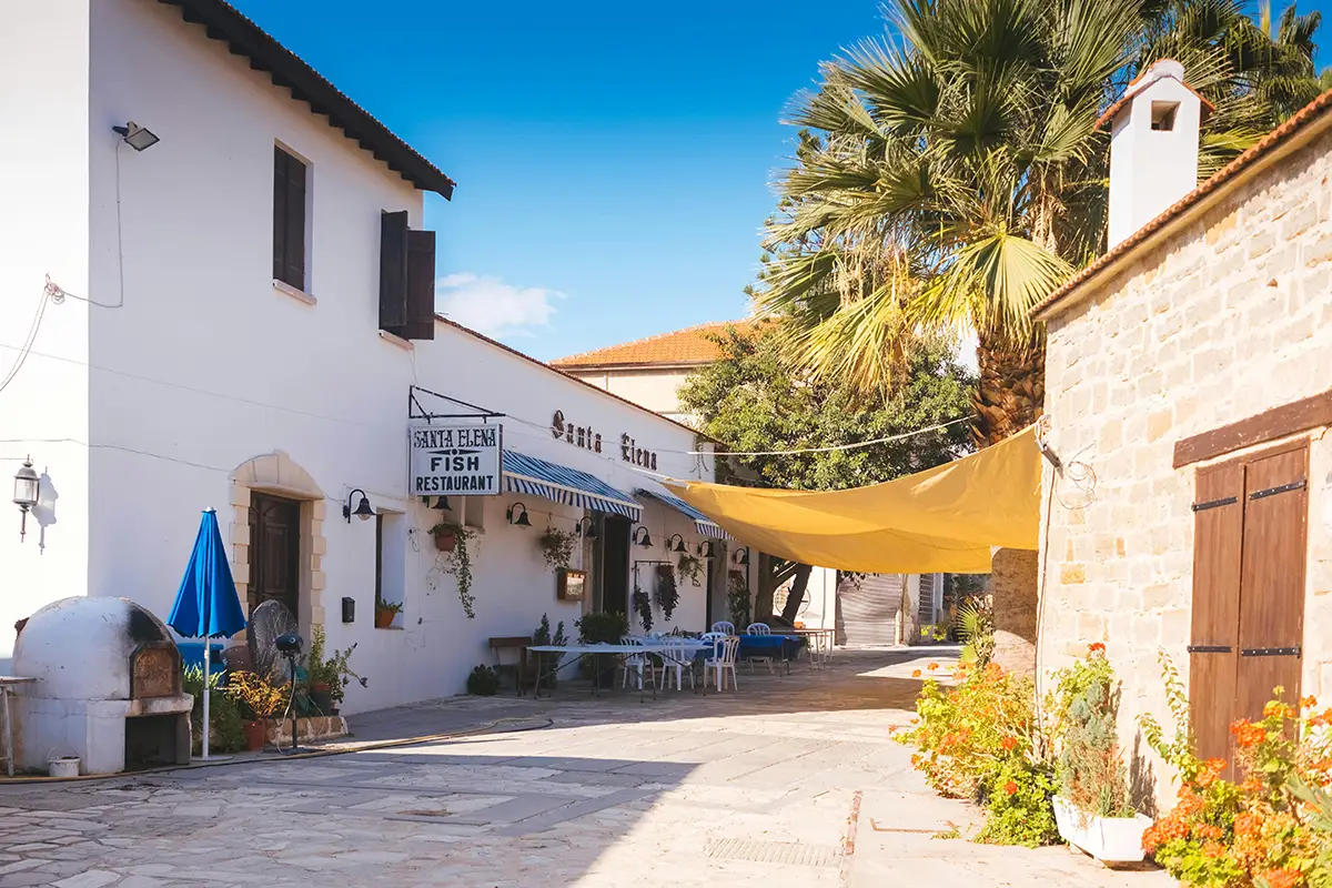 Charming village street with a cozy fish restaurant.