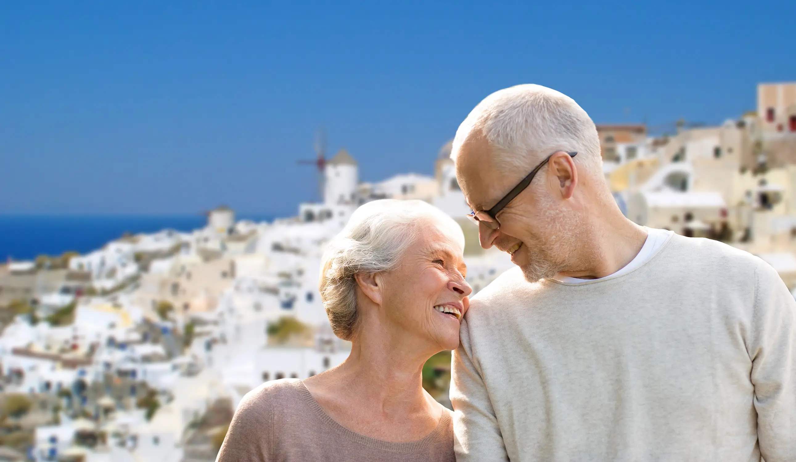 Happy couple retired in Greece, one of the best places to retire in the world.