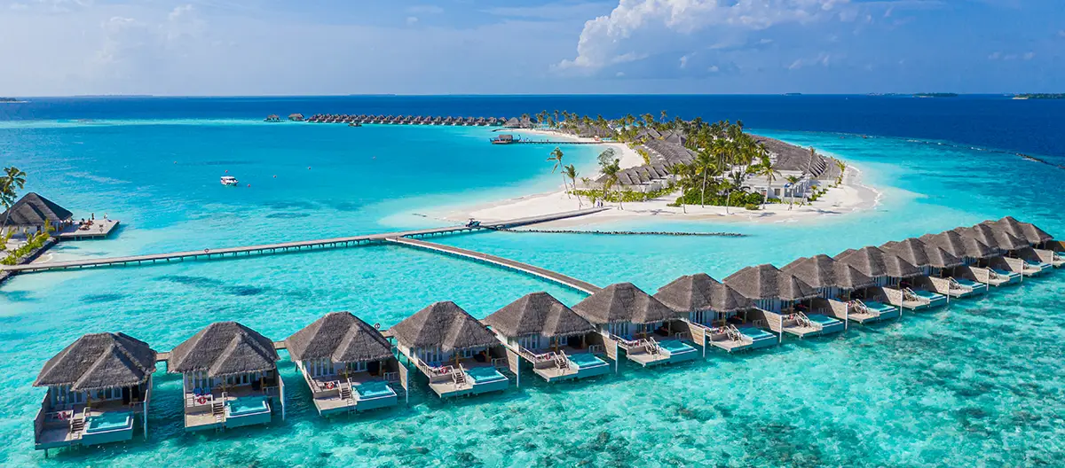 Aerial view of the Maldives, where the land and sea mix perfectly.