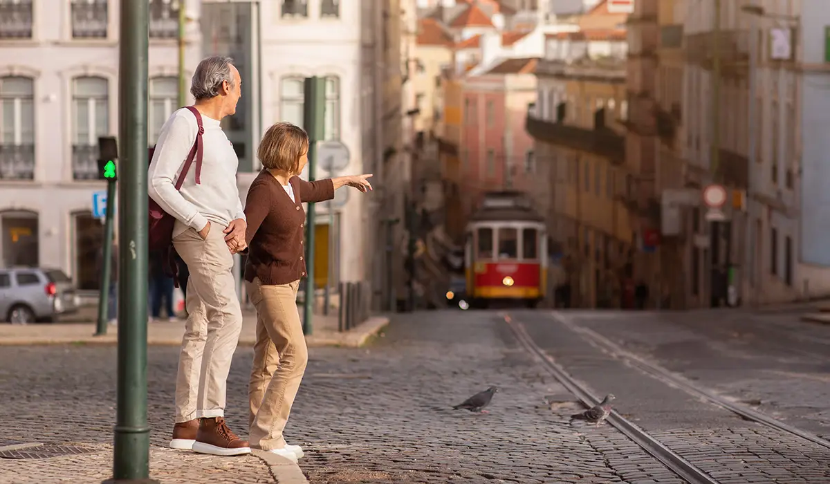 portugal-lisbon-senior-couple-walking.webp